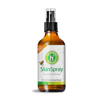 A bottle of skin spray with the label